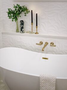 Bathtub With Towel Draped Over Edge