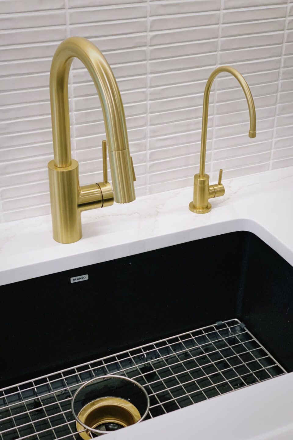 Black Kitchen Sink Design With Stainless Grate