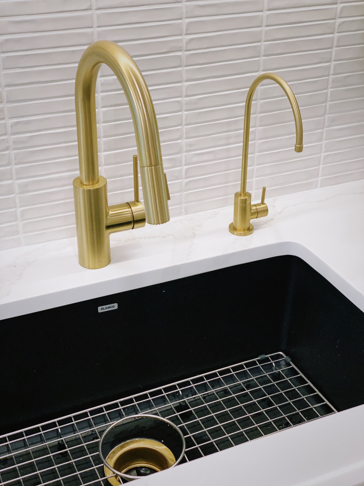 Black Kitchen Sink Design With Stainless Grate