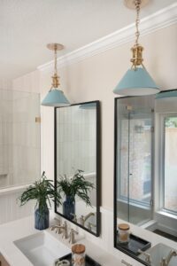 Primary Bathroom Remodel Blue Hanging Lights