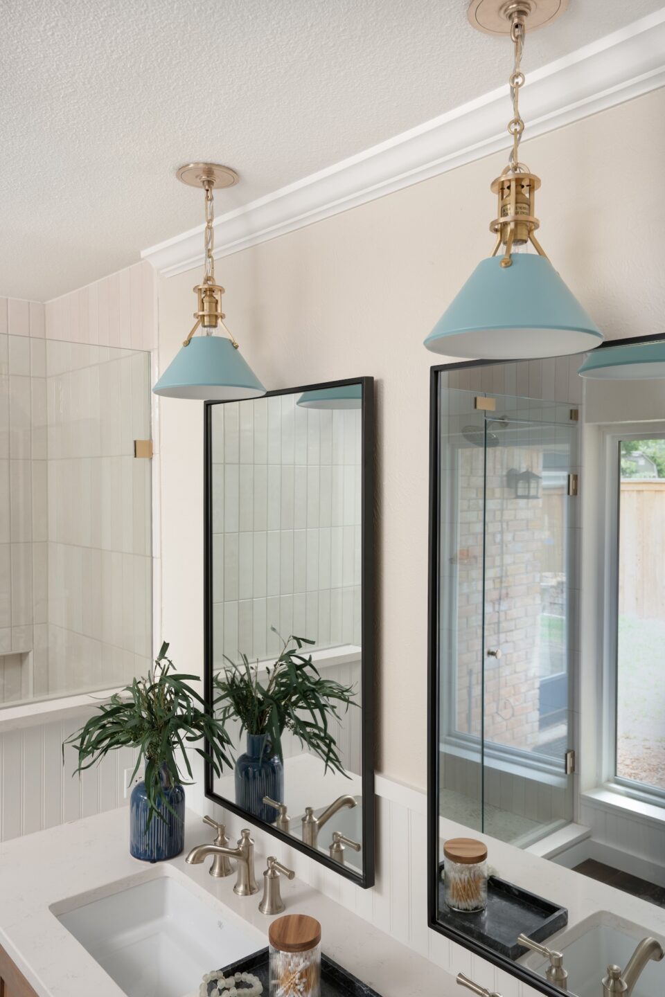 Primary Bathroom Remodel Blue Hanging Lights
