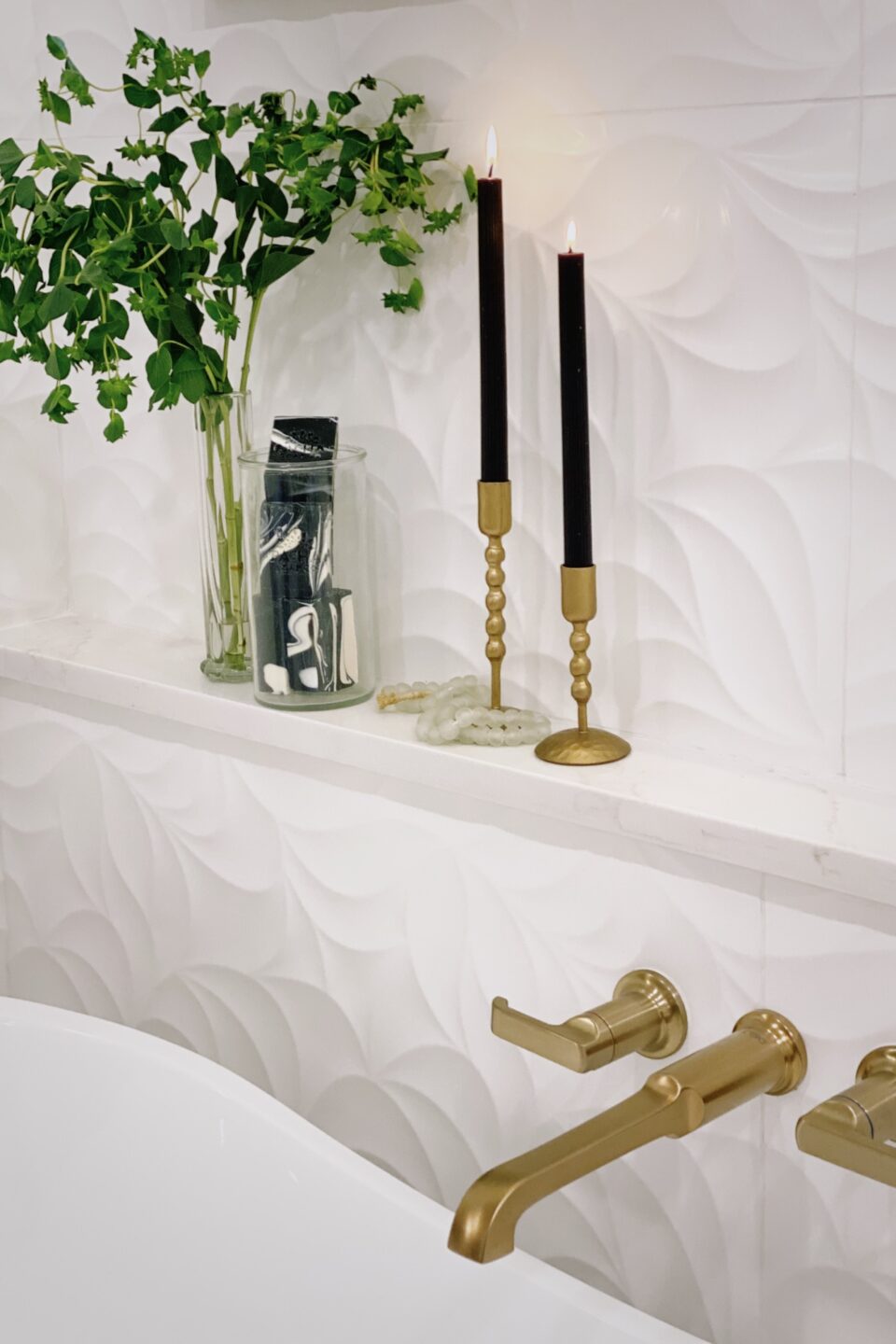 Small Ledge By Bathtub With Lit Candles