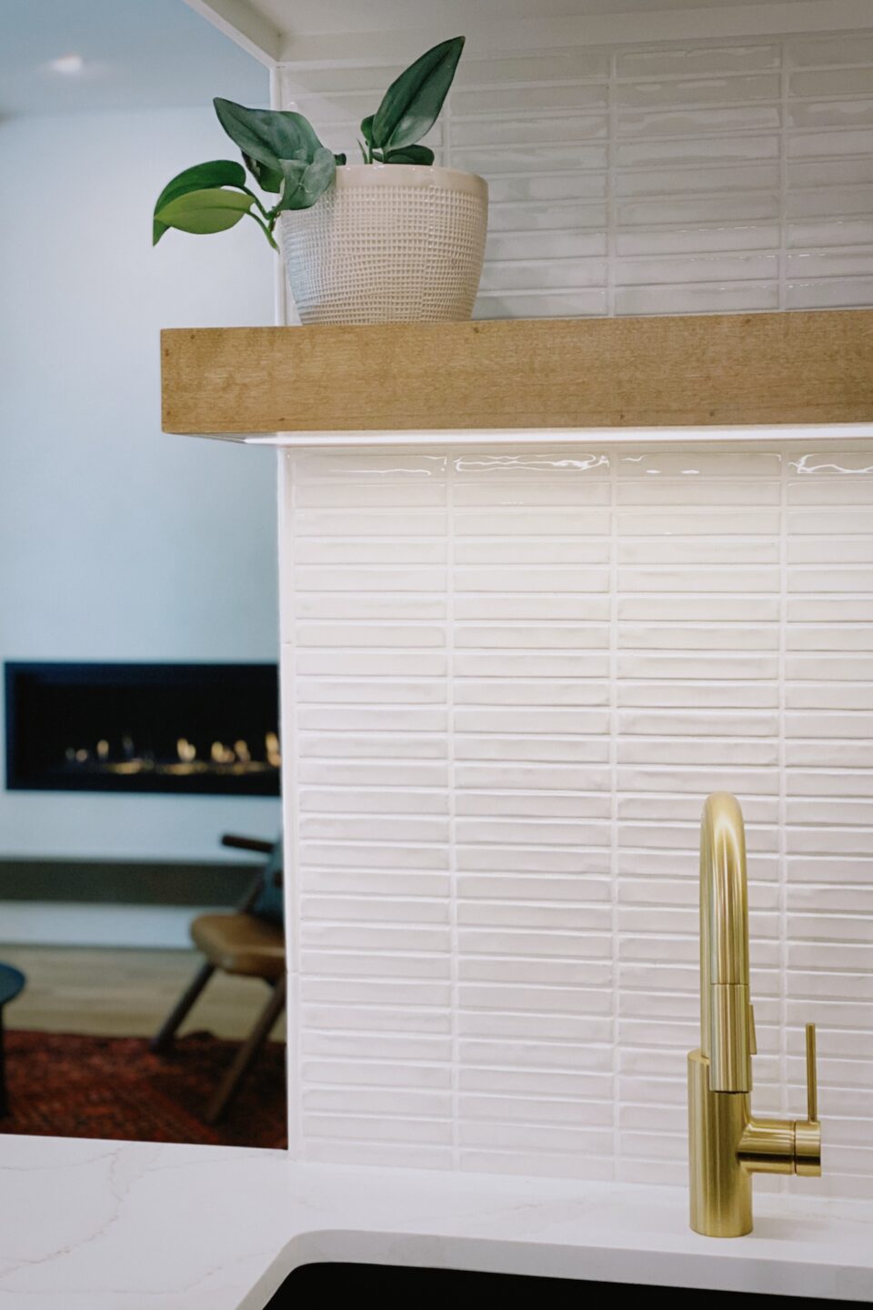 White Tile Blacksplash And Floating Wood Shelf Kitchen